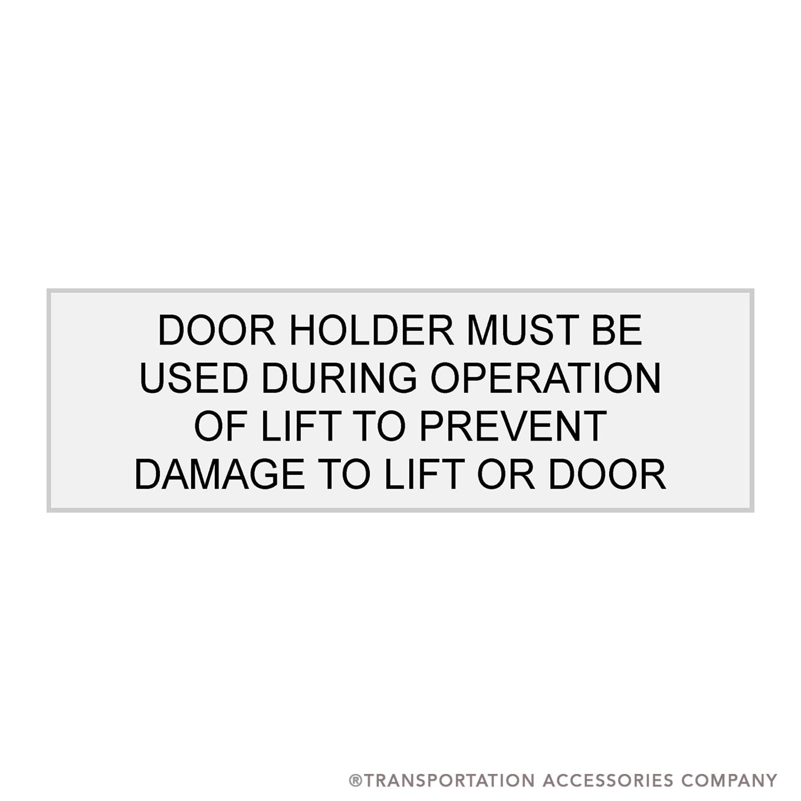 TS-217 Decal "DOOR HOLDER MUST BE USED DURING OPERATION OF LIFT..." Black on White 2" x 6 1/2"